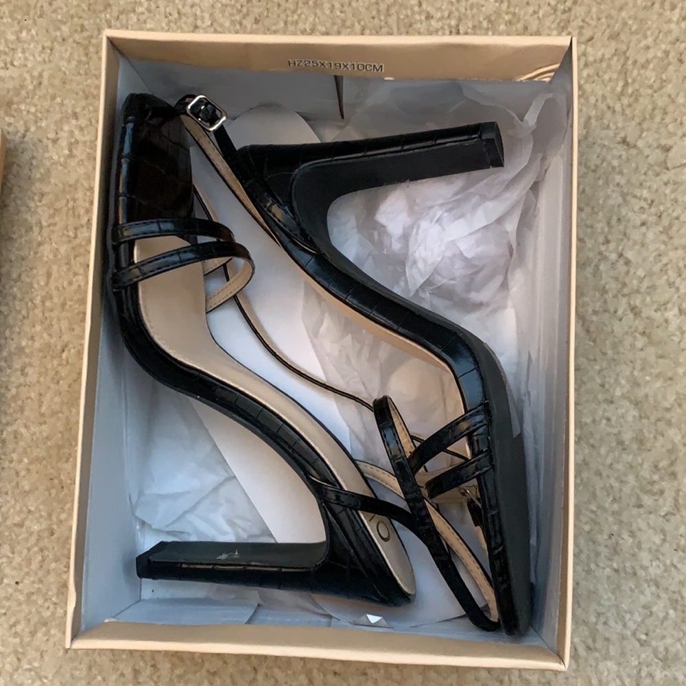 Brand new! Black reptile print heels. Size 8.5, Yoki brand, 3.5 in heel.